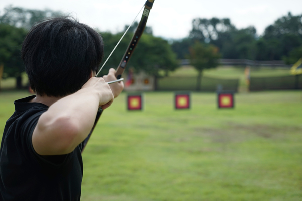 archer preparing to shoot